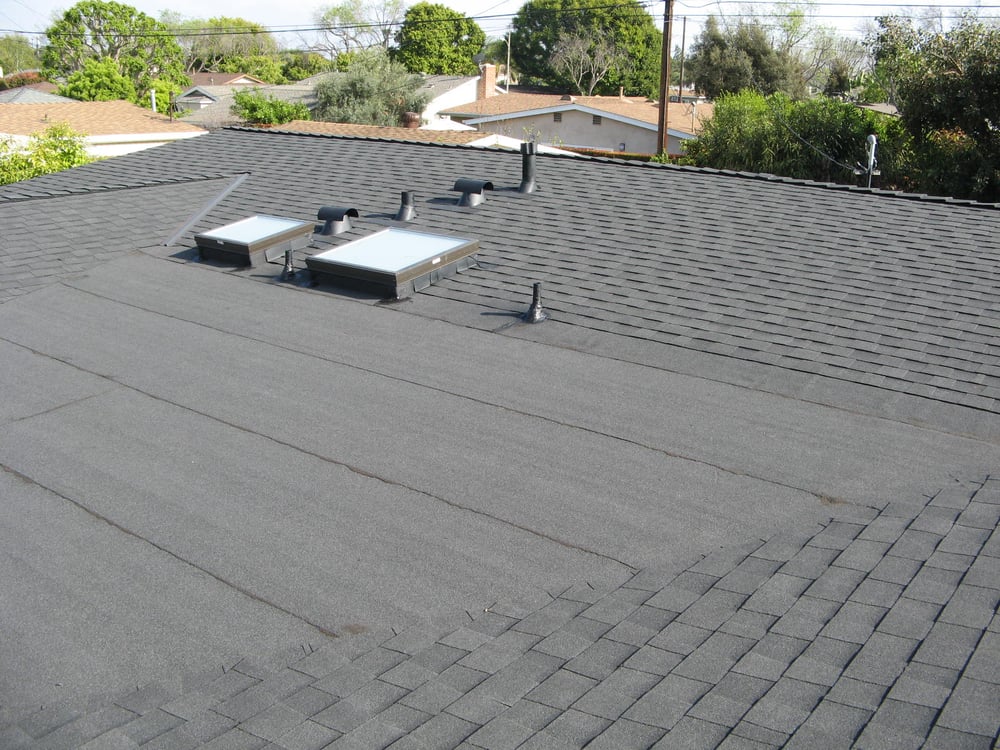 house with modified rolled bitumen roof