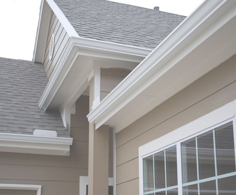 Clean white gutters on new home