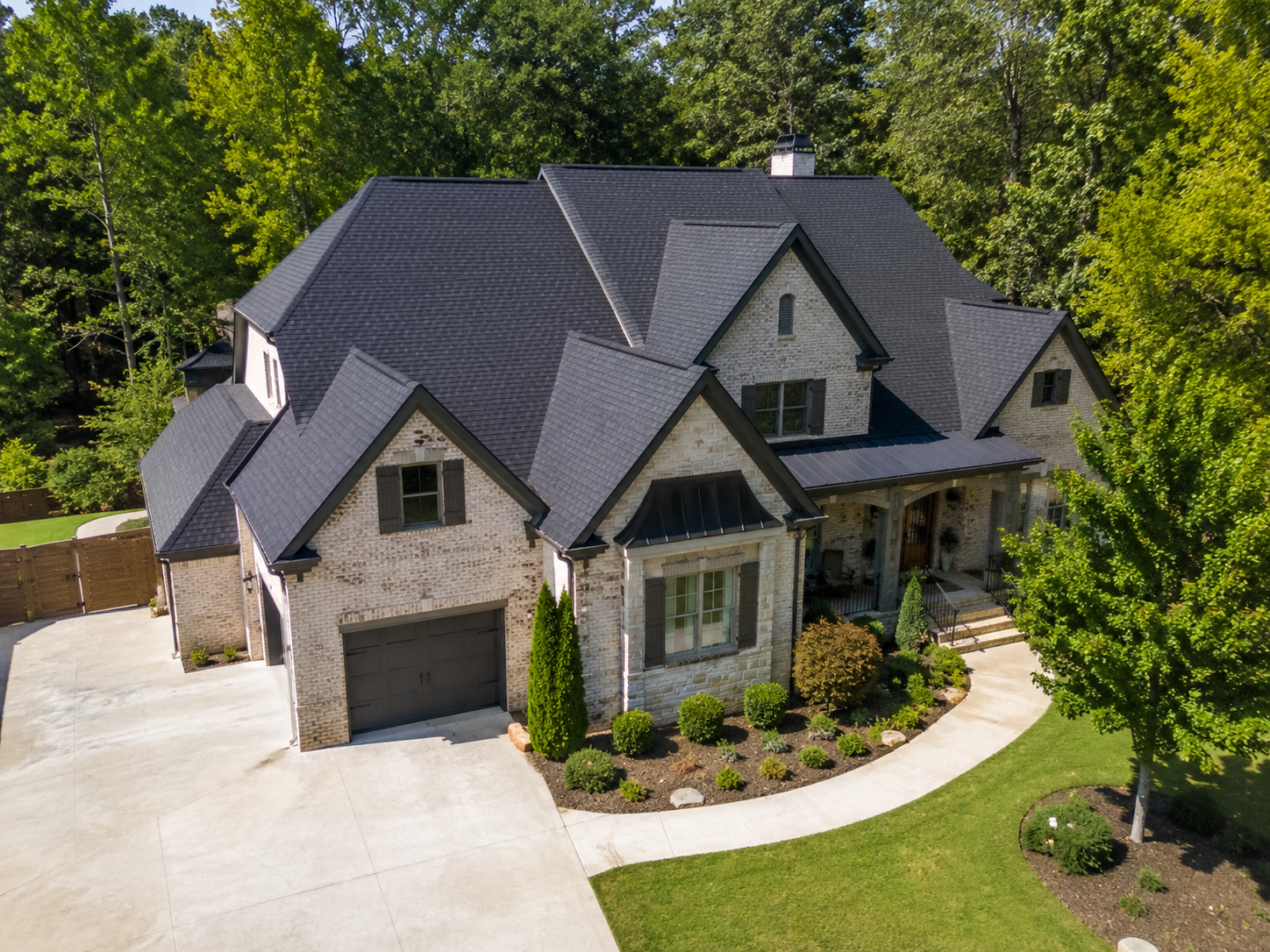 Hail damage roof replacement completed by Caldwell Exteriors on a residential home in Duluth, Georgia