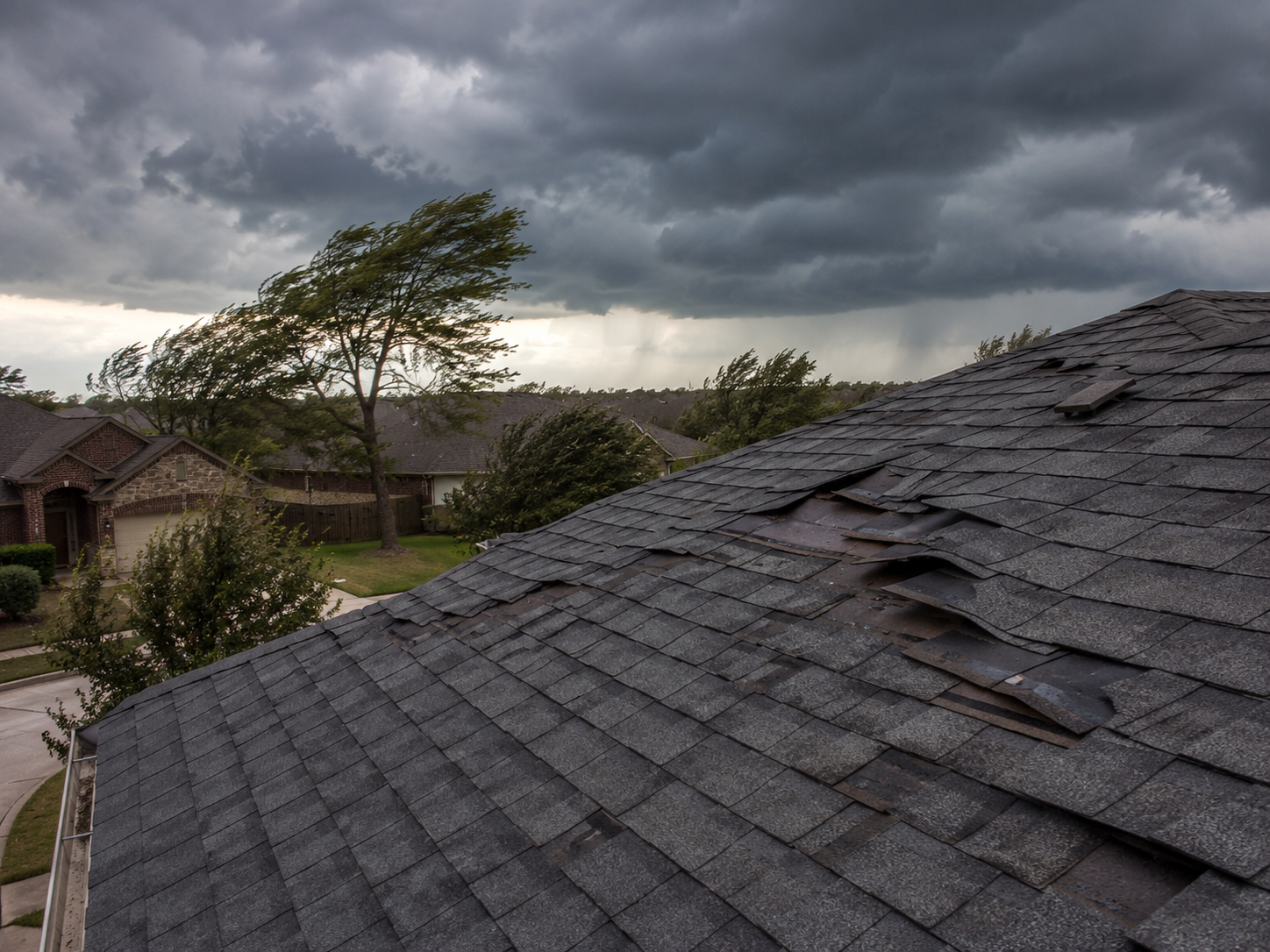 wind damaged roofs in plano texas